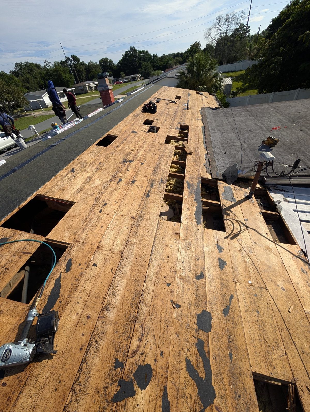 Same roof torn down to the wood deck during replacement