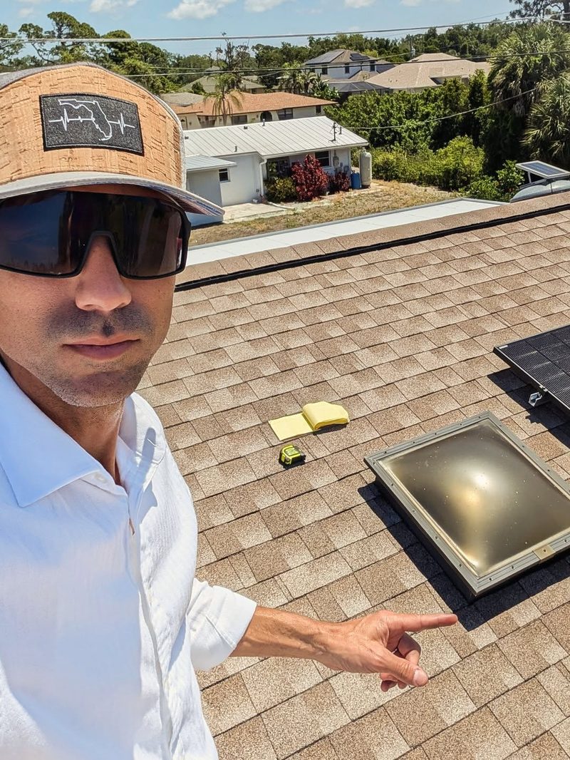 Elliott on a finished roof with new skylight